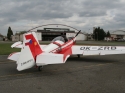 bývalý akrobatický speciál Zlín Z-526AFS-V před hangárem v Letňanech